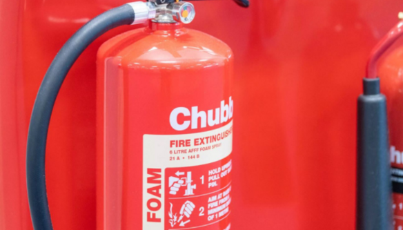 a close-up of a Chubby fire extinguisher