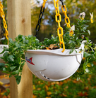 Hanging Speedy hats used as plant pots
