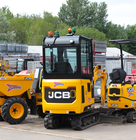 JCB excavators and dumpers at a clean and organised construction site