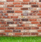 a brick wall with mixed red and orange colour