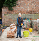 a women doing a plastering project