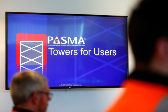 Presentation screen displaying “PASMA Towers for Users” during a training session.