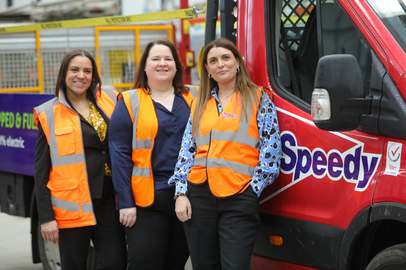 3 Female construction professionals wearing high-visibility Speedy vests