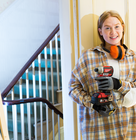 a women holding an impact driver in a DIY project